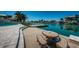 Stunning canal-front property with private dock and seating area at 550 Johns Pass Ave, Madeira Beach, FL 33708