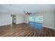 Open living room with water views and wood flooring at 550 Johns Pass Ave, Madeira Beach, FL 33708