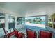 Spacious patio with canal views and seating for four at 550 Johns Pass Ave, Madeira Beach, FL 33708