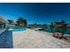 Large kidney-shaped pool with patio and canal views at 550 Johns Pass Ave, Madeira Beach, FL 33708