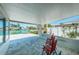 Relaxing patio overlooking the canal, perfect for outdoor enjoyment at 550 Johns Pass Ave, Madeira Beach, FL 33708