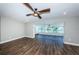 Living room with hardwood floors and views of the canal at 550 Johns Pass Ave, Madeira Beach, FL 33708