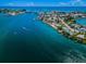 Breathtaking aerial view of waterfront community and bridge at 550 Johns Pass Ave, Madeira Beach, FL 33708