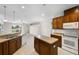 Kitchen with island and stainless steel appliances at 2622 Yukon Cliff Dr, Ruskin, FL 33570