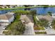Aerial view of single-Gathering home and canal at 2622 Yukon Cliff Dr, Ruskin, FL 33570