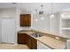 Kitchen features granite countertops and stainless steel appliances at 2622 Yukon Cliff Dr, Ruskin, FL 33570