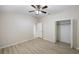 Bedroom with ceiling fan and walk-in closet at 2622 Yukon Cliff Dr, Ruskin, FL 33570