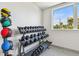 Gym featuring weights and exercise balls, promoting fitness and well-being in-house at 400 150Th Ave # 301, Madeira Beach, FL 33708