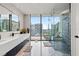 Spa-like bathroom with walk-in shower and city view at 1000 Water St # 1703, Tampa, FL 33602