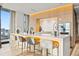 Modern kitchen with island, quartz countertops, and stainless steel appliances at 1000 Water St # 1703, Tampa, FL 33602