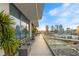 Spacious balcony offering stunning city skyline views at sunset at 1000 Water St # 1703, Tampa, FL 33602