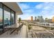 Modern balcony with glass railings and a cityscape view at 1000 Water St # 1703, Tampa, FL 33602