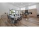 Open dining area with modern table and chairs, adjacent to kitchen at 4511 24Th S Ave, St Petersburg, FL 33711