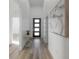 Light and airy entryway with hardwood floors and modern decor at 4511 24Th S Ave, St Petersburg, FL 33711