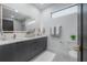 Modern bathroom with double vanity and gray cabinets at 4511 24Th S Ave, St Petersburg, FL 33711