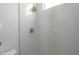 Walk-in shower with marble tile and gold fixtures at 4511 24Th S Ave, St Petersburg, FL 33711