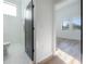 Bright bathroom with a toilet and door to bedroom at 4511 24Th S Ave, St Petersburg, FL 33711