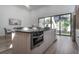 Modern kitchen island with granite countertop and built-in oven at 4511 24Th S Ave, St Petersburg, FL 33711