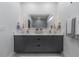 Double vanity bathroom with modern finishes and a large mirror at 4511 24Th S Ave, St Petersburg, FL 33711