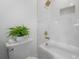 Clean bathroom with white bathtub and marble tile at 4511 24Th S Ave, St Petersburg, FL 33711