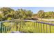 Private balcony overlooking a lush green landscape and bridge at 6251 Vista Verde W Dr, St Petersburg, FL 33707