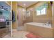 Relaxing bathroom with soaking tub and walk-in shower at 6251 Vista Verde W Dr, St Petersburg, FL 33707