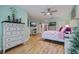 Bright bedroom with large dresser and a view of another room at 6251 Vista Verde W Dr, St Petersburg, FL 33707
