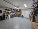 Spacious garage with epoxy flooring and ample storage at 6251 Vista Verde W Dr, St Petersburg, FL 33707