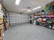 Large garage with ample storage space and epoxy flooring at 6251 Vista Verde W Dr, St Petersburg, FL 33707