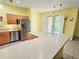 Kitchen with stainless steel appliances and breakfast bar at 6251 Vista Verde W Dr, St Petersburg, FL 33707