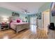 Spacious main bedroom with hardwood floors and access to balcony at 6251 Vista Verde W Dr, St Petersburg, FL 33707
