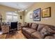 Home office with a comfortable couch and built-in desk at 6251 Vista Verde W Dr, St Petersburg, FL 33707