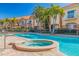 Inviting pool and spa with surrounding tropical landscaping at 6251 Vista Verde W Dr, St Petersburg, FL 33707