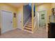 Staircase with hardwood steps, leading to the upper floor at 6251 Vista Verde W Dr, St Petersburg, FL 33707