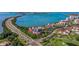 Beautiful coastal condo complex with waterfront views, lush landscaping, and a nearby golf course at 6365 Bahia Del Mar Blvd # 105, St Petersburg, FL 33715