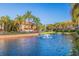 Landscaped pond with fountain in front of community at 6251 Vista Verde W Dr, St Petersburg, FL 33707