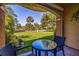 Private patio with outdoor seating, overlooking a grassy area at 6251 Vista Verde W Dr, St Petersburg, FL 33707