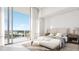 Bright bedroom with balcony access and city views at 400 Central Ave # 2007, St Petersburg, FL 33701