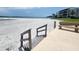 Beach access with steps and bench; ocean views at 851 Bayway Blvd # 205, Clearwater Beach, FL 33767