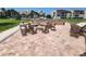 Outdoor patio with fire pit and seating at 851 Bayway Blvd # 205, Clearwater Beach, FL 33767