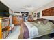 King-size bedroom with ceiling fan and plenty of storage at 851 Bayway Blvd # 205, Clearwater Beach, FL 33767