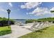 Enjoy the view from this waterfront patio area with lounge chairs at 12760 Indian Rocks Rd # 710, Largo, FL 33774