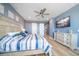 Bright and airy main bedroom with private balcony access at 300 150Th Ave # 411, Madeira Beach, FL 33708