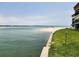 Stunning view of the calm water and sandy shoreline at 851 Bayway Blvd # 205, Clearwater Beach, FL 33767