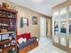 Bright entryway with storage bench and built-in shelving at 851 Bayway Blvd # 205, Clearwater Beach, FL 33767