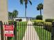 Gated entrance to a private waterfront community at 851 Bayway Blvd # 205, Clearwater Beach, FL 33767