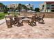 Community fire pit with seating area at 851 Bayway Blvd # 205, Clearwater Beach, FL 33767