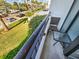 Partial view of the street and surrounding buildings from the balcony at 851 Bayway Blvd # 205, Clearwater Beach, FL 33767