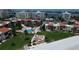 Aerial view of waterfront community with pool and beach access at 851 Bayway Blvd # 205, Clearwater Beach, FL 33767