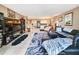 Spacious living room with open floor plan and a view of the kitchen at 851 Bayway Blvd # 205, Clearwater Beach, FL 33767